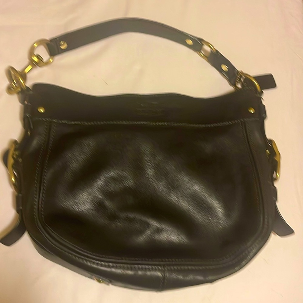 Coach authentic leather Handbag Dark brown with serial number. Great condition